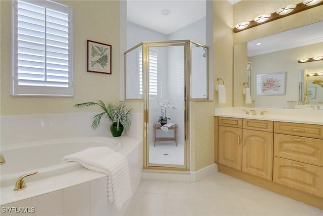 full bathroom featuring healthy amount of natural light, a garden tub, vanity, a stall shower, and lofted ceiling