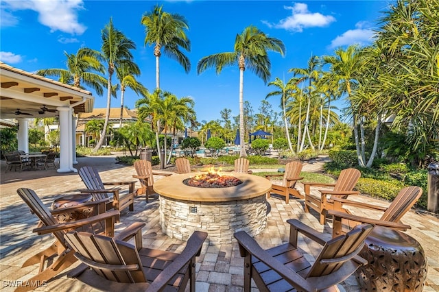 11265 Suffield St, Fort Myers, FL 33913 - view of patio with an outdoor fire pit and a ceiling fan
