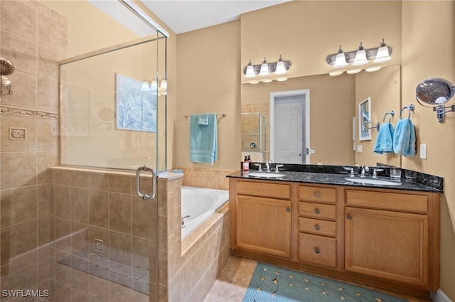 11265 Suffield St, Fort Myers, FL 33913 - full bathroom featuring a bath, a stall shower, double vanity, and tile patterned flooring