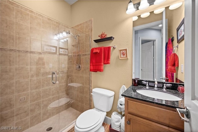 11265 Suffield St, Fort Myers, FL 33913 - bathroom featuring a shower stall, toilet, and vanity