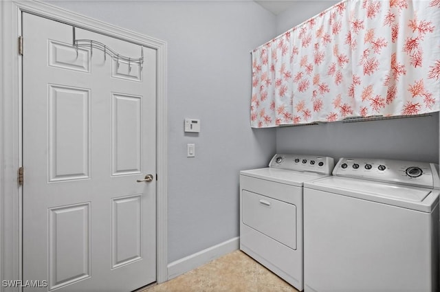 11265 Suffield St, Fort Myers, FL 33913 - laundry room featuring washing machine and dryer and baseboards