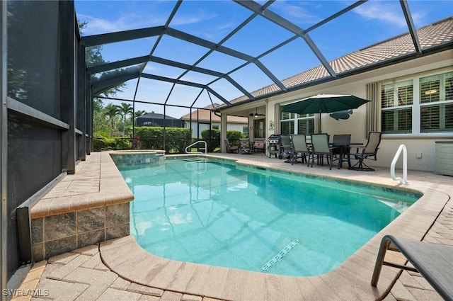 11265 Suffield St, Fort Myers, FL 33913 - swimming pool featuring an outdoor hot tub, a patio area, a lanai, and outdoor dining area
