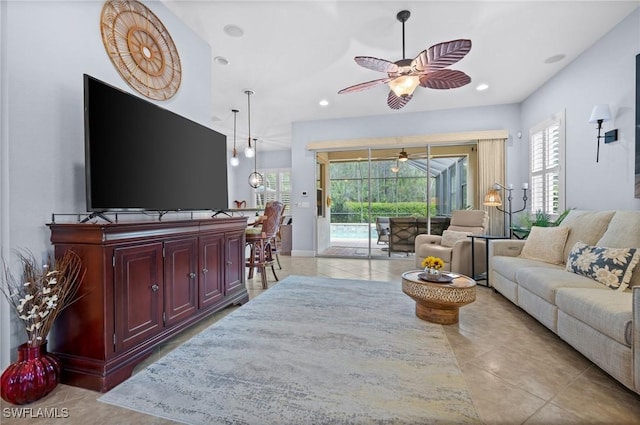 11265 Suffield St, Fort Myers, FL 33913 - living area with ceiling fan, plenty of natural light, light tile patterned flooring, and recessed lighting