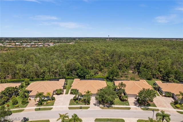 11265 Suffield St, Fort Myers, FL 33913 - aerial perspective of suburban area with a heavily wooded area