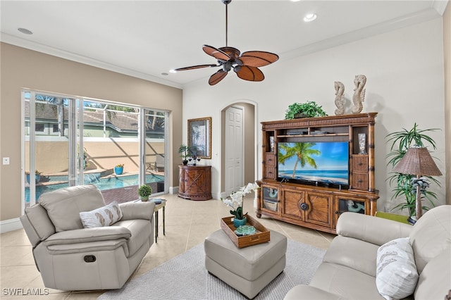 3417 Marbella Ct, Bonita Springs, FL 34134 - living area featuring crown molding, arched walkways, recessed lighting, baseboards, and a ceiling fan