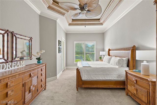 3417 Marbella Ct, Bonita Springs, FL 34134 - bedroom featuring a raised ceiling, crown molding, light colored carpet, a ceiling fan, and baseboards