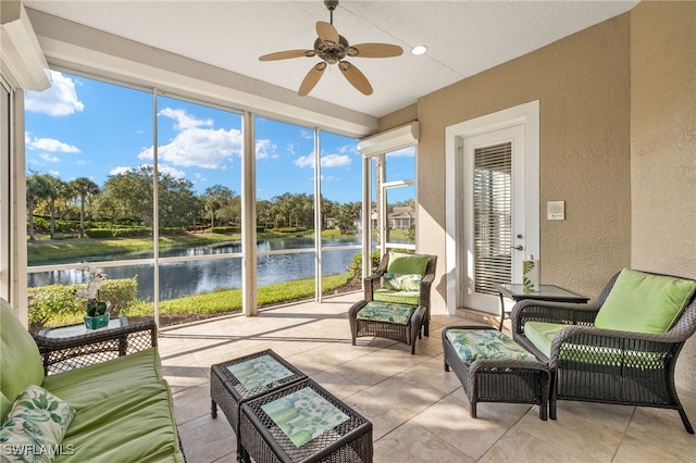 3417 Marbella Ct, Bonita Springs, FL 34134 - sunroom featuring a water view, a ceiling fan, outdoor lounge area, and view of scattered trees