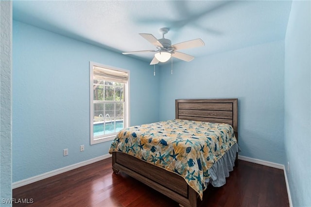 681 23rd St NW, Naples, FL 34120 - bedroom featuring baseboards, wood finished floors, and ceiling fan