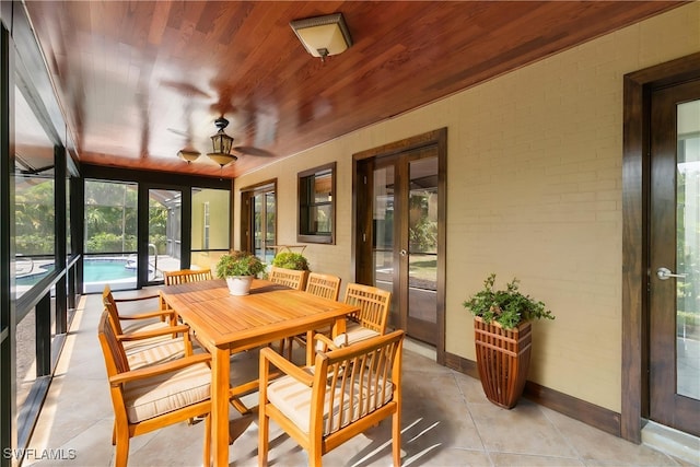 681 23rd St NW, Naples, FL 34120 - sunroom with french doors