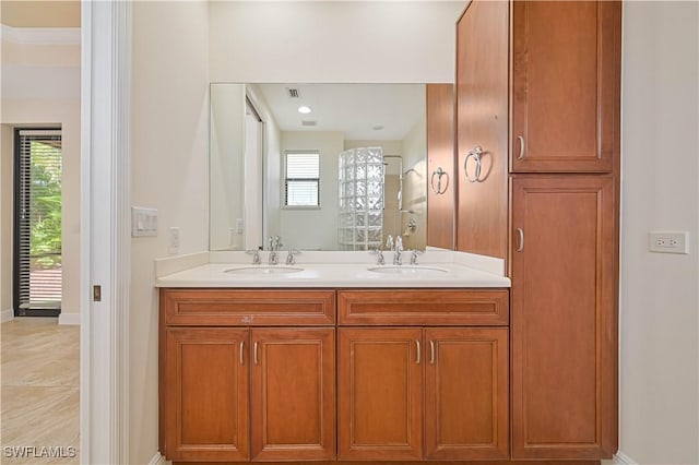 4910 SW 17th Pl Unit 4B, Cape Coral, FL 33914 - bathroom featuring double vanity and plenty of natural light