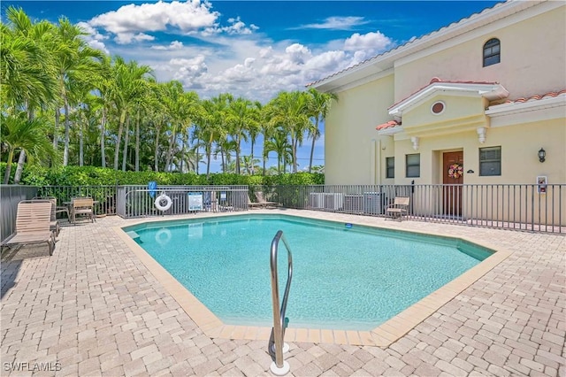 4910 SW 17th Pl Unit 4B, Cape Coral, FL 33914 - community pool featuring a patio
