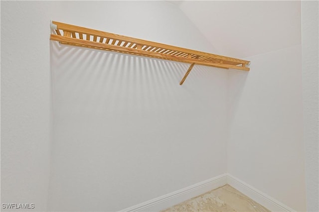 4910 SW 17th Pl Unit 4B, Cape Coral, FL 33914 - spacious closet with light marble finish floors and lofted ceiling