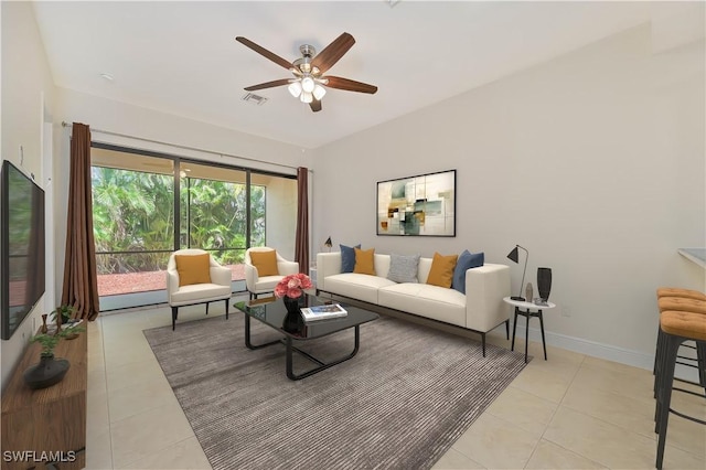 4910 SW 17th Pl Unit 4B, Cape Coral, FL 33914 - living area featuring light tile patterned flooring and a ceiling fan