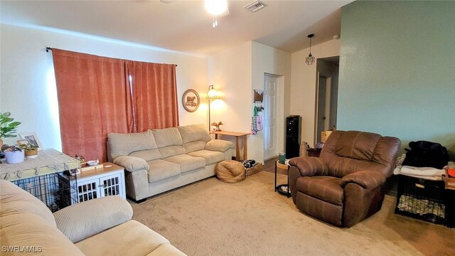 3086 E Briarwood Cir, Labelle, FL 33935 - carpeted living room featuring ceiling fan and lofted ceiling