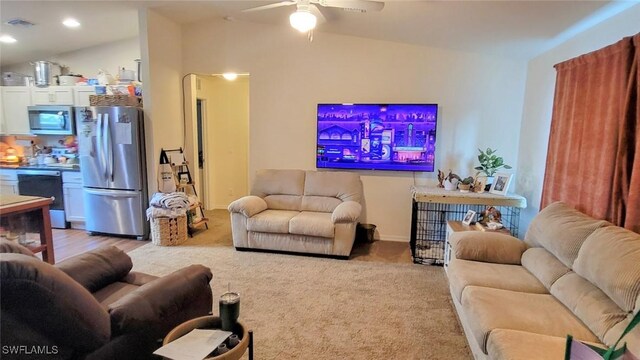 3086 E Briarwood Cir, Labelle, FL 33935 - living room featuring ceiling fan, recessed lighting, and carpet