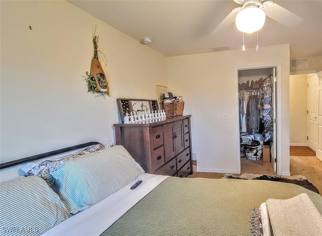3086 E Briarwood Cir, Labelle, FL 33935 - bedroom featuring a closet, baseboards, a walk in closet, and a ceiling fan