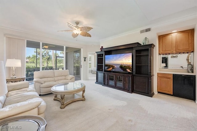 8015 Tiger Cv Unit 204, Naples, FL 34113 - living area featuring ceiling fan, light carpet, and crown molding