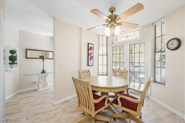 8015 Tiger Cv Unit 204, Naples, FL 34113 - dining space with plenty of natural light, light tile patterned flooring, and a ceiling fan