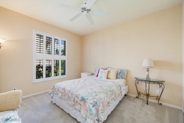 8015 Tiger Cv Unit 204, Naples, FL 34113 - bedroom featuring carpet floors, baseboards, and ceiling fan