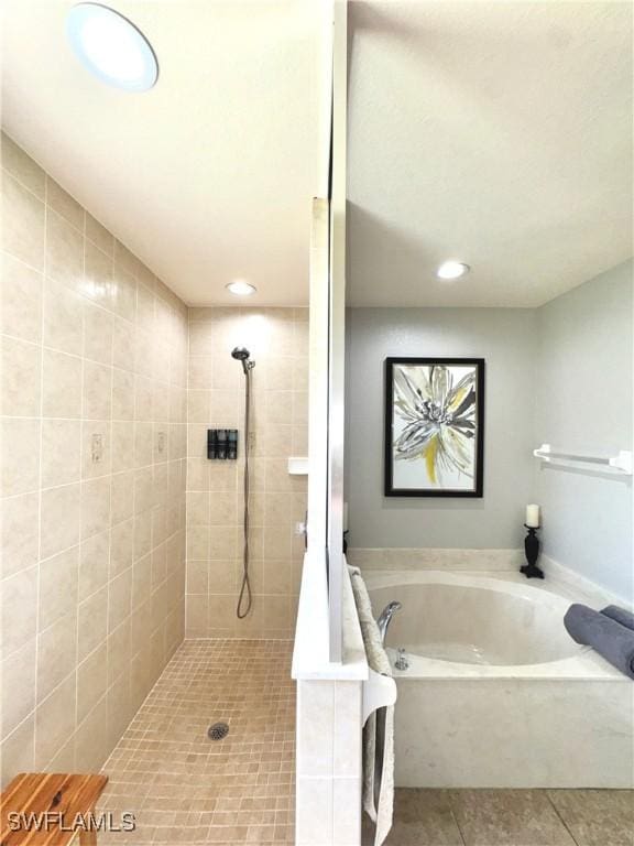 2639 SW 5th St, Cape Coral, FL 33991 - bathroom featuring tiled shower, a garden tub, tile patterned flooring, and recessed lighting