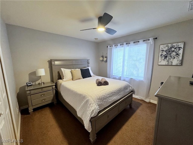 2639 SW 5th St, Cape Coral, FL 33991 - bedroom featuring dark carpet, baseboards, and a ceiling fan