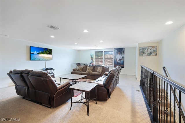 living room with light carpet, recessed lighting, and baseboards