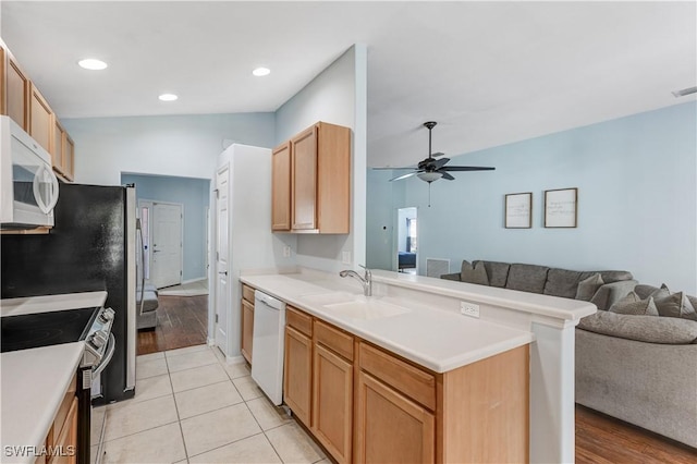 2664 Astwood Ct, Cape Coral, FL 33991 - kitchen with white appliances, open floor plan, a peninsula, ceiling fan, and a sink