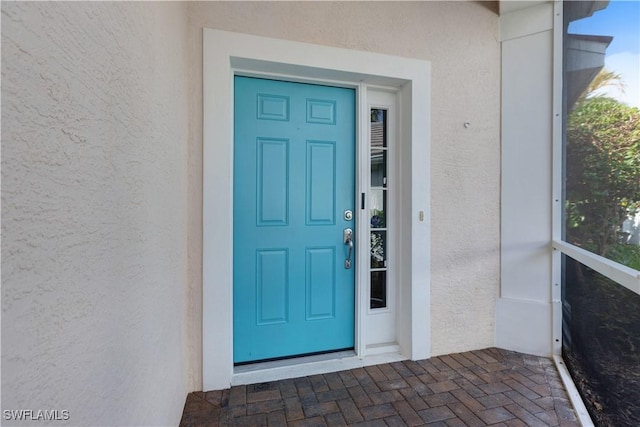 2664 Astwood Ct, Cape Coral, FL 33991 - entrance to property with stucco siding