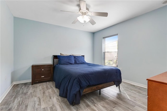 2664 Astwood Ct, Cape Coral, FL 33991 - bedroom with light wood-type flooring, baseboards, and ceiling fan