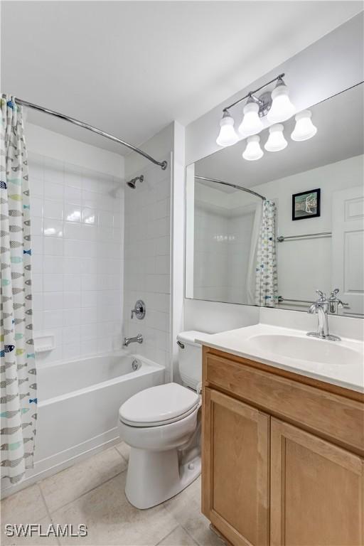 2664 Astwood Ct, Cape Coral, FL 33991 - full bathroom featuring tile patterned floors, shower / bath combo with shower curtain, toilet, and vanity