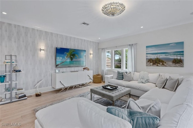 714 Killdeer Pl, Naples, FL 34108 - living room featuring wallpapered walls, wood finished floors, baseboards, recessed lighting, and an accent wall