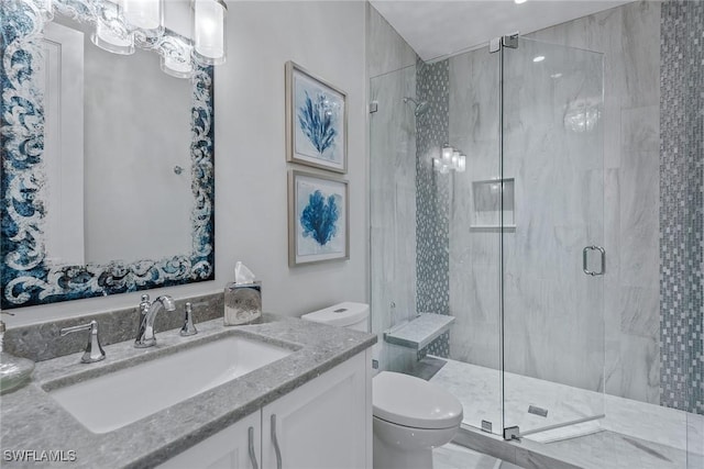 714 Killdeer Pl, Naples, FL 34108 - full bathroom featuring toilet, a marble finish shower, and vanity