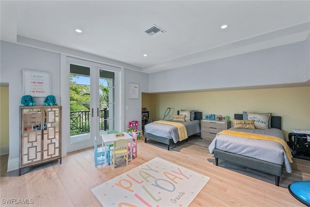 714 Killdeer Pl, Naples, FL 34108 - bedroom with access to outside, french doors, wood finished floors, and recessed lighting