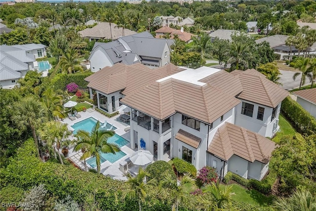 714 Killdeer Pl, Naples, FL 34108 - aerial perspective of suburban area with a pool area
