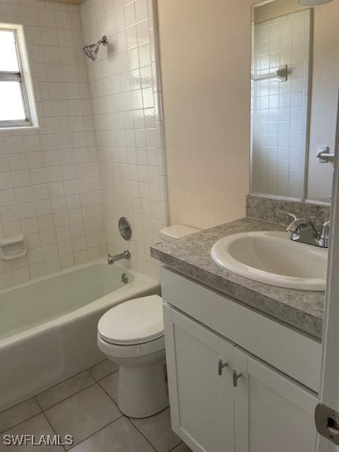 full bath featuring tile patterned flooring, shower / bath combination, vanity, and toilet