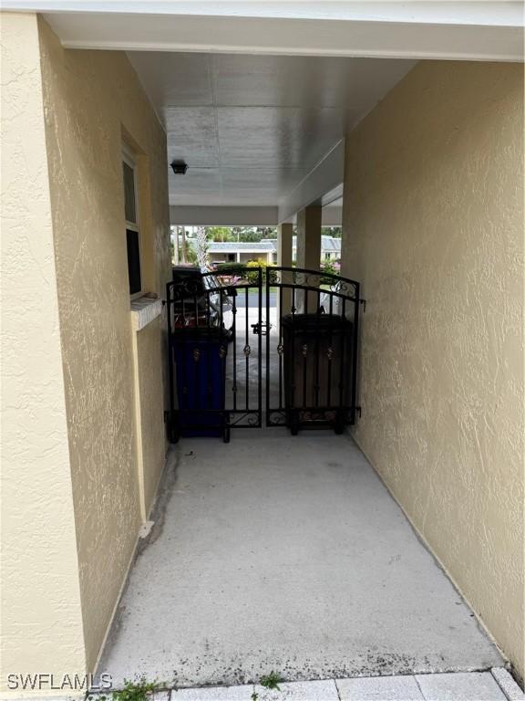 view of patio featuring a balcony
