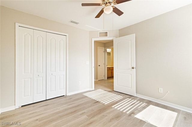 209 Magellan St, Fort Myers, FL 33913 - unfurnished bedroom featuring light wood-style flooring, a closet, baseboards, and ceiling fan