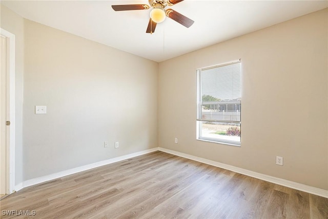 209 Magellan St, Fort Myers, FL 33913 - unfurnished room with wood finished floors, ceiling fan, and baseboards