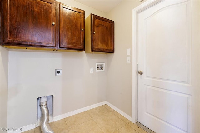 209 Magellan St, Fort Myers, FL 33913 - washroom featuring electric dryer hookup, cabinet space, baseboards, washer hookup, and light tile patterned floors