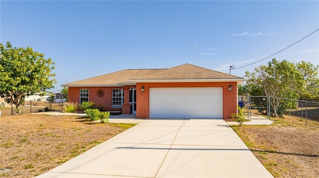 209 Magellan St, Fort Myers, FL 33913 - ranch-style house with fence, a garage, driveway, stucco siding, and a gate
