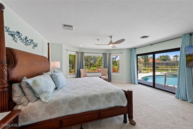 bedroom featuring access to outside, carpet, a ceiling fan, and baseboards