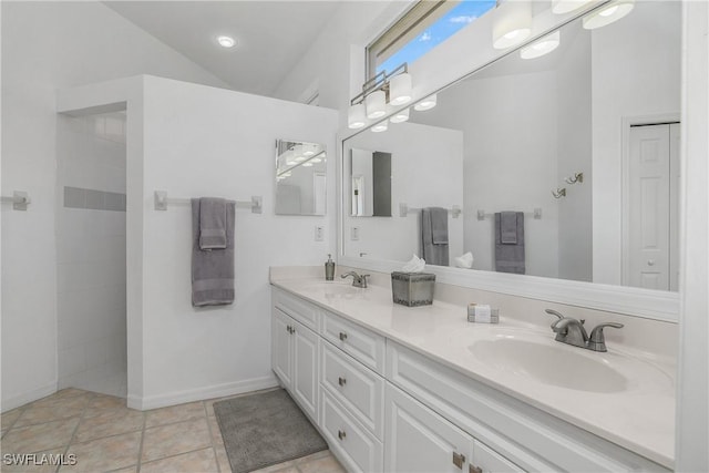 170 Vista Ln, Naples, FL 34119 - bathroom featuring double vanity and baseboards