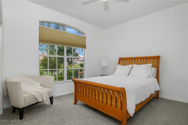 170 Vista Ln, Naples, FL 34119 - bedroom featuring multiple windows, carpet flooring, and baseboards
