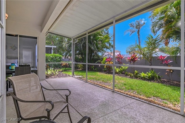 170 Vista Ln, Naples, FL 34119 - unfurnished sunroom featuring plenty of natural light