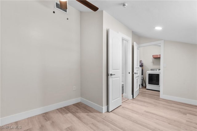 interior space with washer / clothes dryer, light wood finished floors, baseboards, and recessed lighting
