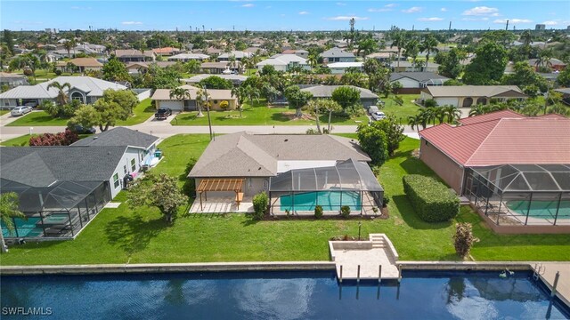 aerial view of residential area featuring a pool area