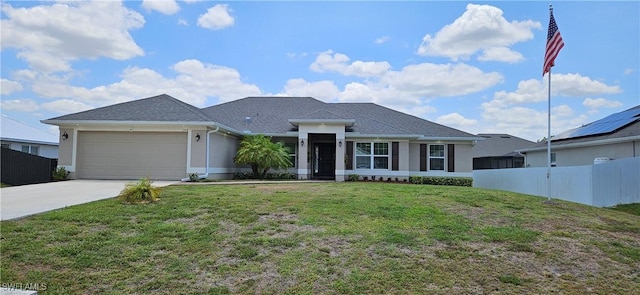 1948 Redmont Ave, Lehigh Acres, FL 33972 - view of front facade with concrete driveway, a garage, and stucco siding
