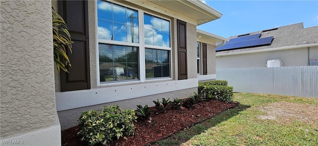1948 Redmont Ave, Lehigh Acres, FL 33972 - view of side of home featuring fence and stucco siding