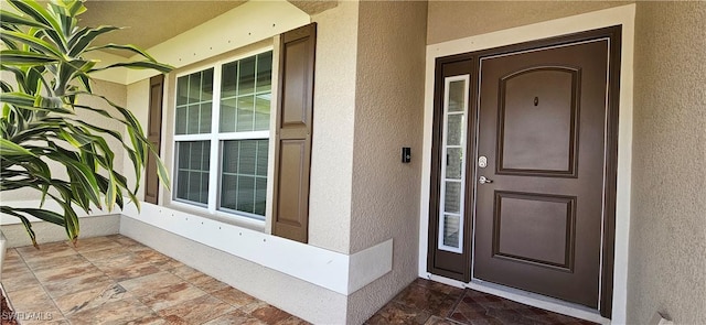 1948 Redmont Ave, Lehigh Acres, FL 33972 - property entrance with stucco siding