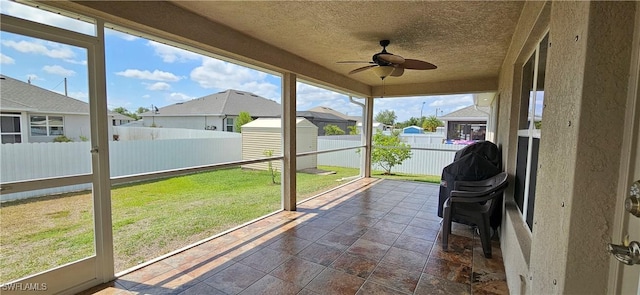 1948 Redmont Ave, Lehigh Acres, FL 33972 - sunroom / solarium with ceiling fan and a residential view
